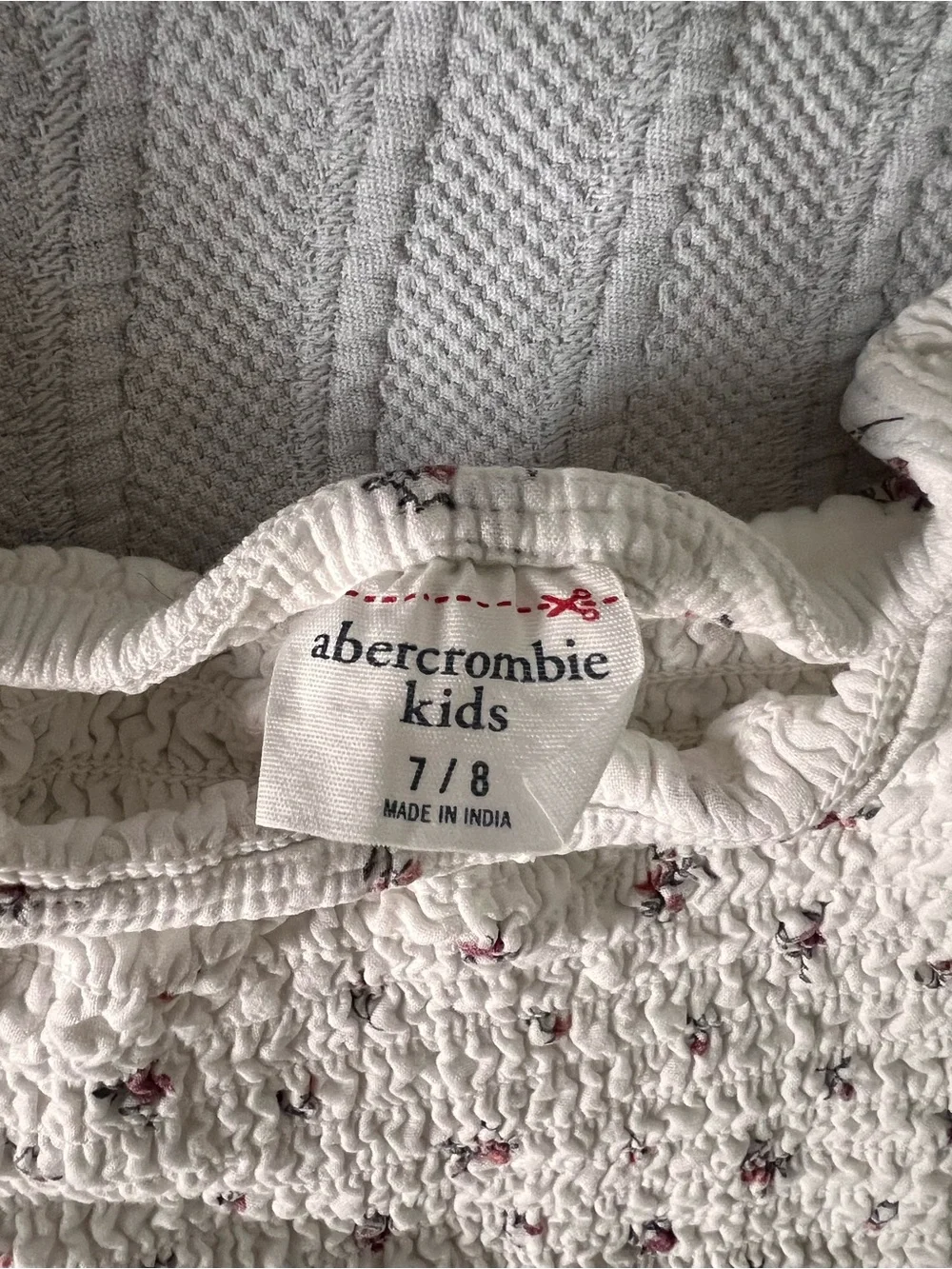 abercrombie kids White Smocked Romper with Small Pink Floral Accents